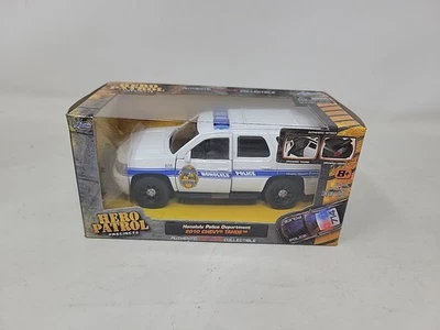 SUV CHEVY TAHOE JADA 1/32 HERO PATROL BLANCO/AZUL POLICÍA HONOLULU 2010 Foto 1 de 4