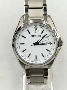 Orologio Uomo Seiko 7B75-0AA0 Radio Controllo Onda Titanio Bianco Argento Solare - Foto 1 di 8