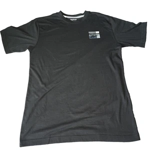 Camisa Reebok negra talla S, con diferentes logotipos de marcas en la espalda - Imagen 1 de 8