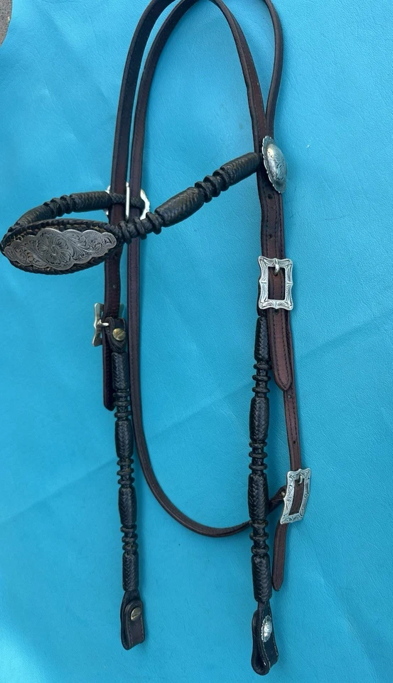 Cabecero vintage de cuero flamenco y canguro de plata de ley Foto 1 de 4