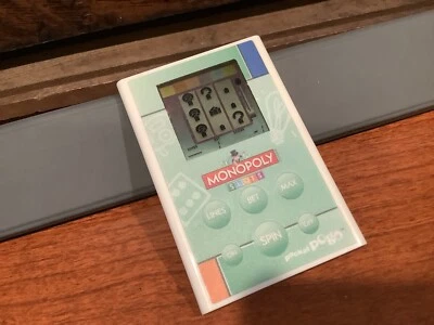Monopoly Slots - Pocket Pogo Electronic Handheld Game NEW Battery - Image 1 of 4