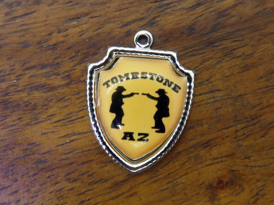 Vintage silver TOMESTONE ARIZONA STATE COWBOYS TRAVEL SHIELD charm 13-45 - Image 1 of 1