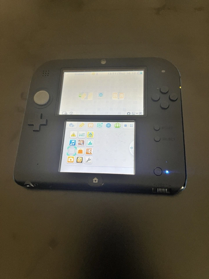 Nintendo 2DS Handheld with R4 Card [2000+ Games] - Image 1 of 4