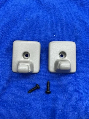 Par de clips parasol Ford Edge 2007-2010 color beige OEM Foto 1 de 4