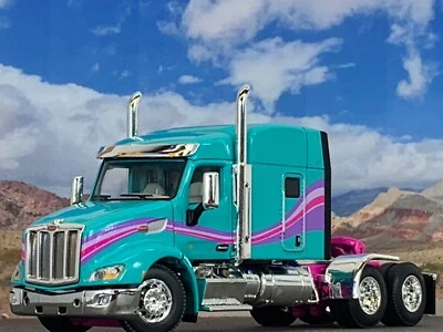 1/64 DCP TEAL/PINK/PURPLE PETERBILT 579 W/ 72" MID ROOF SLEEPER - Image 1 of 4