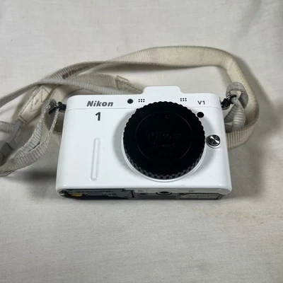 Cuerpo de cámara Nikon 1 V1 sin espejo solo blanco no funciona Foto 1 de 4