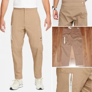 Nuevo con etiquetas Nike ropa deportiva tejida sin forrar pantalones de carga para hombre caqui DD7034 208 talla 36 - Imagen 1 de 8