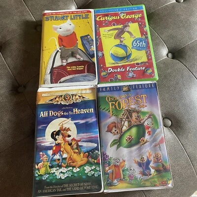 VHS Dogs Go Heaven, Once Upon A Forest, Curious George, Stuart Little - Image 1 of 4