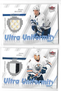 Lot 2 2007-08 Fleer Ultra Uniformity Jerseys #UJS Jarret Stoll #UMC Bryan McCabe - Picture 1 of 2
