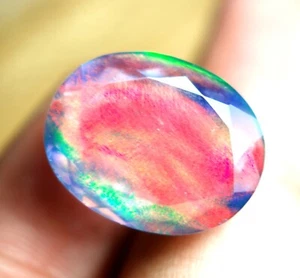 19.15  Ct Ethiopian Natural Fire Opal Play of Color Carving Oval  Cut Gemstone - Picture 1 of 6