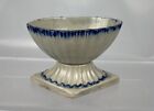 An English pearlware salt, 18th century. Blue feather decoration