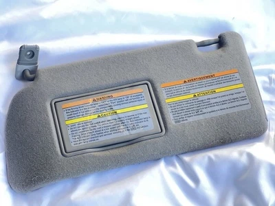 2005-2012 Nissan Frontier/Xterra Driver Left Side Sun Visor Gray Cloth - Image 1 of 3