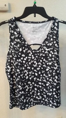 Camiseta sin mangas Nike Dri Fit ajustada para mujer M atlética negra/blanca con estampado floral Foto 1 de 4