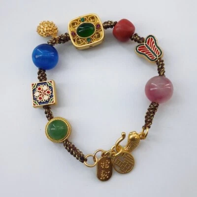 Pulsera de la suerte tejida a mano con coloridas incrustaciones accesorios y cuentas personalizadas Foto 1 de 4