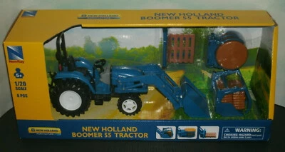 1/20 Scale New Holland Boomer 55 Tractor & Attachments (8pcs) New-Ray SS-05056 - Image 1 of 3