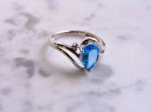 1.90Ct Pear Lab Created Blue Topaz Halo Engagement Ring In 14K White Gold Plated