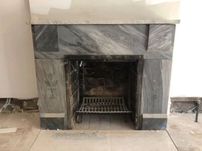 Chimenea envolvente de mármol tallada a mano Foto 1 de 3