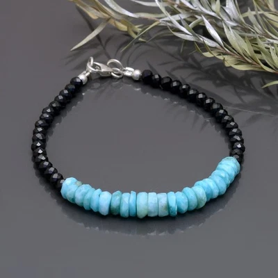 Hermosa Pulsera AA Natural Negra Espinela y Larimar Forma de Rueda Cuentas, Foto 1 de 3