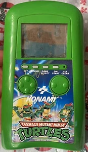VTG 1989 Konami Teenage Mutant Ninja Turtles TMNT Handheld VideoGame Not Working - Picture 1 of 2