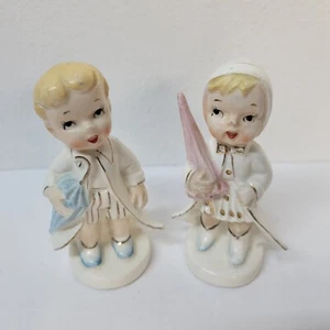 Vintage Victoria figurine set Boy Girl Rainy Day Salt and Pepper Shakers Kitschy - Picture 1 of 8