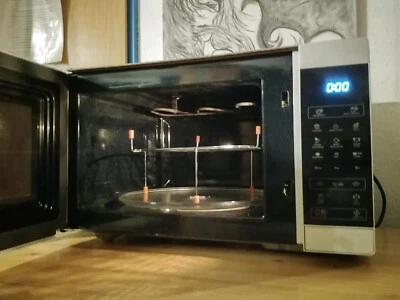 Sharp YC-MG81E-S Mikrowelle mit Grillfunktio - Schwarz/Silber - Bild 1 von 4