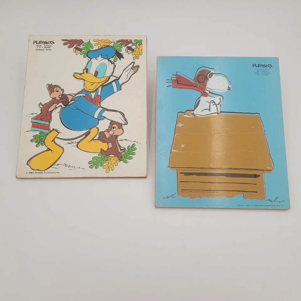 2 rompecabezas de madera Playskool de colección. Pato Donald 190-02. 230-02 Snoopy Red Baron 1965 Foto 1 de 4