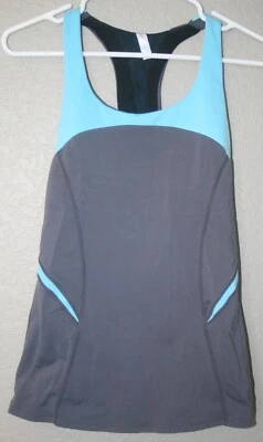 Camiseta sin mangas para mujer GAP FIT gris y acuática espalda cruzada camisa de entrenamiento talla pequeña usada en excelente estado Foto 1 de 3