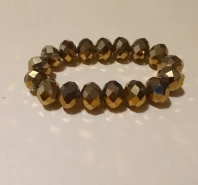 Pulsera elástica con cuentas corte faceta cristal bronce oscuro unisex Foto 1 de 4