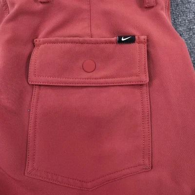 Pantalones de golf Nike para hombre rojos chinos bolsillos de carga delanteros planos 34x32 Foto 1 de 4