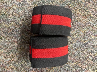 Cantraband Knee Wraps, 1 Red Strip, Black, Never Used - Image 1 of 2