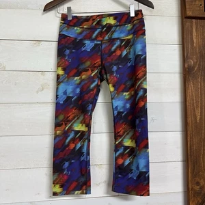 Athleta Hose Damen Gr. S sportliche Capri Leggings Colorburst Sonar Yoga - Bild 1 von 15