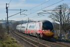 PHOTO  VIRGIN TRAINS PENDOLINO SPEEDS PAST THE SITE OF SHAP STATION WITH THE 06.