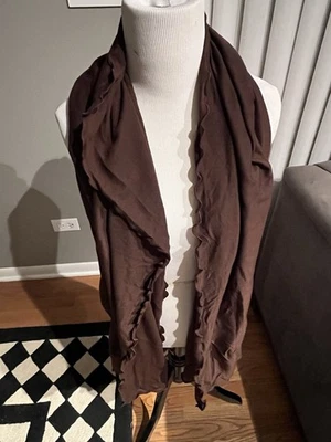 NWT lovely black wrap with ruffled edges around the edges.  Great carrying case. - Image 1 of 4