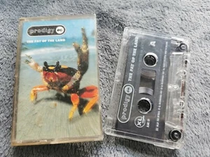 Prodigy - Fat Of The Land (Cassette 1997) VG+/Exc - Bild 1 von 3