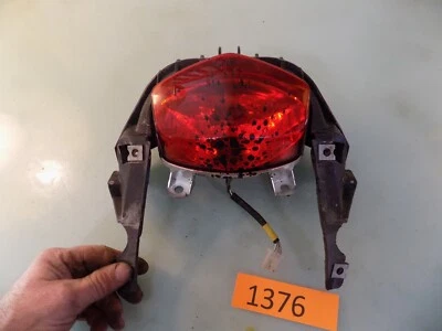 08 HYOSUNG GT250R OEM LUZ TRASERA LUZ DE FRENO TRASERA USADA Foto 1 de 3