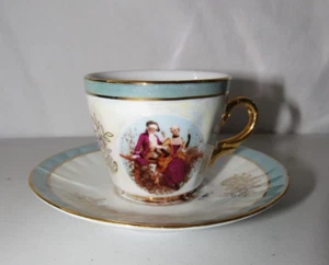 COSMOS USA SKY BLUE COLONIAL COUPLE GOLD LUSTER FILIGREE DEMITASSE CUP & SAUCER - Picture 1 of 7