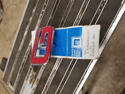 OEM NEW Front Grille "G" Emblem Badge Red w/ Chrome Trim 91-12 GMC 15634639 - Image 1 of 3