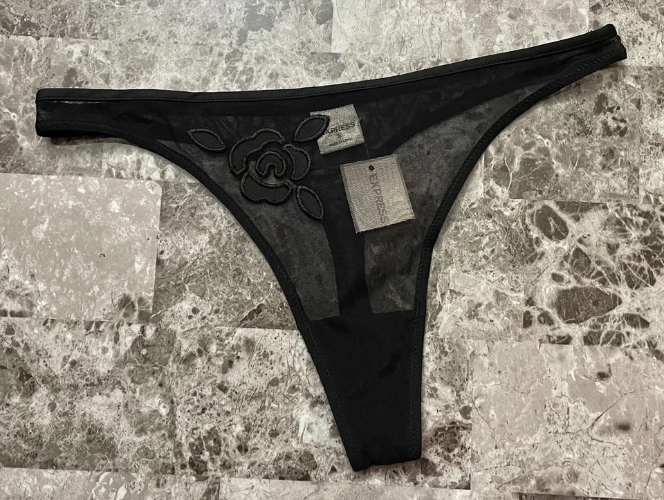 NUEVO CON ETIQUETAS EXPRESS PEQUEÑAS BRAGAS TANGA NEGRAS DE MALLA TRANSPARENTE BORDADAS FLORES RARAS VINTAGE Foto 1 de 3