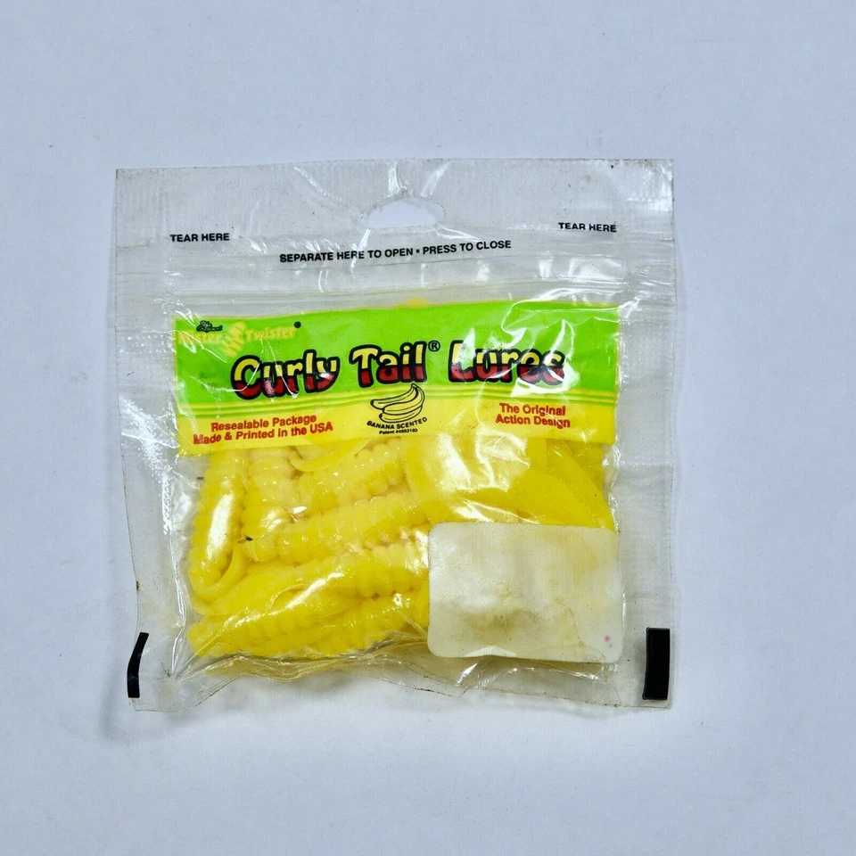 Señuelo de pesca Mister Twister 3 pulgadas 20 paquete cola rizada cebos blandos amarillo Foto 1 de 3