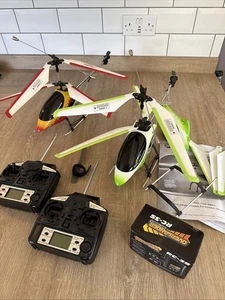2 RC Helicopters repair Parts Only 2 Remotes RV Charger No Batteries Included - Picture 1 of 22
