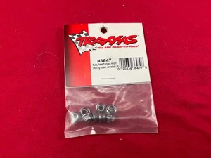 Traxxas 3647 Nuts, 4mm flanged nylon locking (steel, serrated) (8) wheel nuts - Picture 1 of 3