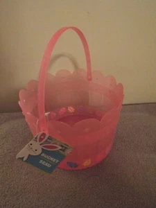 Pink Plastic Easter Bucket with Colorful Painted eggs along bottom - Picture 1 of 2