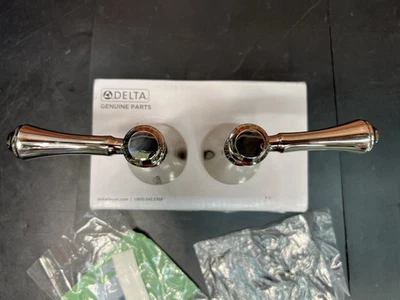 Juego de 2 manijas de grifo de palanca de níquel pulido Delta Cassidy H297PN Foto 1 de 4