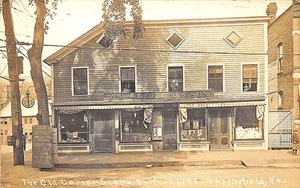 Springfield VT Old Corner Store Front's Building Clock cartolina RPPC - Foto 1 di 2