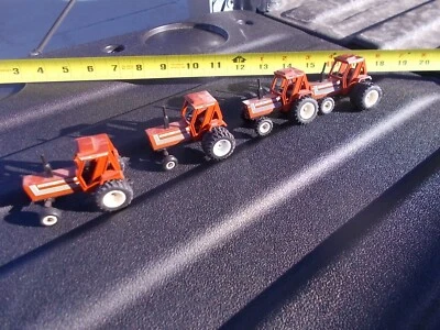 Hesston 100 90 2wd 100 90 FWA 130 90 Duals FWA  180 90 Duals FWA  Tractor  1/64. - Image 1 of 4