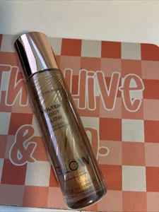 Revolution Glow Molten Body Glow Face & Body Liquid Illuminator, Bronze, 3.38oz - Picture 1 of 5