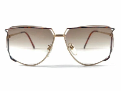 NUEVAS GAFAS DE SOL VINTAGE TURA MD 425 SIN MONTURA GRAN TAMAÑO ORO TORTUGA AÑOS 70 JAPÓN Foto 1 de 4