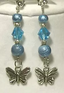 ORECCHINI MODA CYNTHIA LYNN COLORI VOLANTI CRISTALLO BLU TIBET ARGENTO FARFALLA - Foto 1 di 1