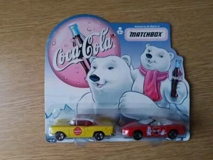 Matchbox Coca Cola Two Cars Pack. Camaro Convertible & Chevy Bel Air Scale 1:64. - Picture 1 of 4