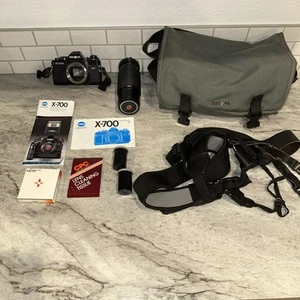 Minolta X-700 analoge Kleinbild-Spiegelreflexkamera mit Anleitungen, Tasche, Kabelbaum, Hoya 75-300 m Objektiv - Bild 1 von 22